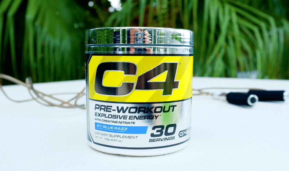 container of c4 pre-workout next to a jump rope
